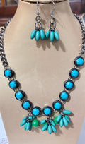 Conjunto ródio e verde orquídea